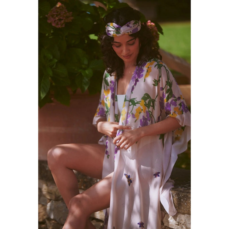 One Hundred Stars Throwover Wisteria Lilac on model sitting 1