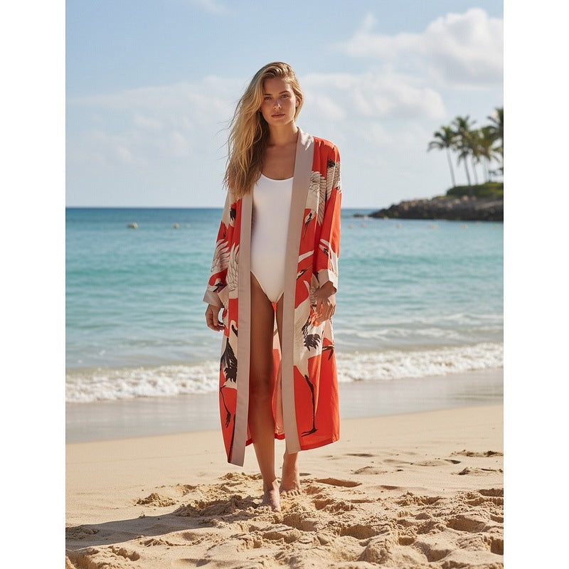 One Hundred Stars Stork Scarlet Dressing Gown on model front on beach 
