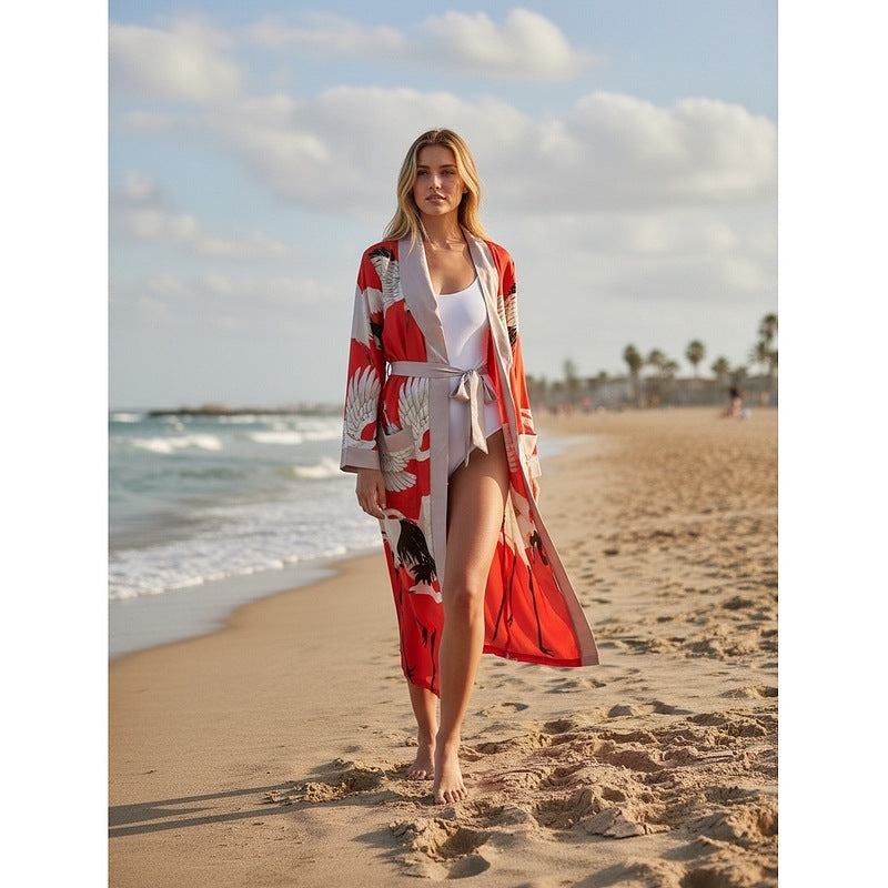 One Hundred Stars Stork Scarlet Dressing Gown on model walking on beach