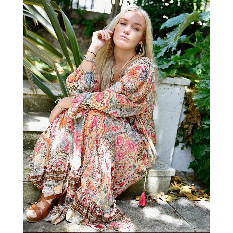 Powell Craft Tuuli Floral Print Long-Sleeve Dress DRV890 on model sitting on steps 1