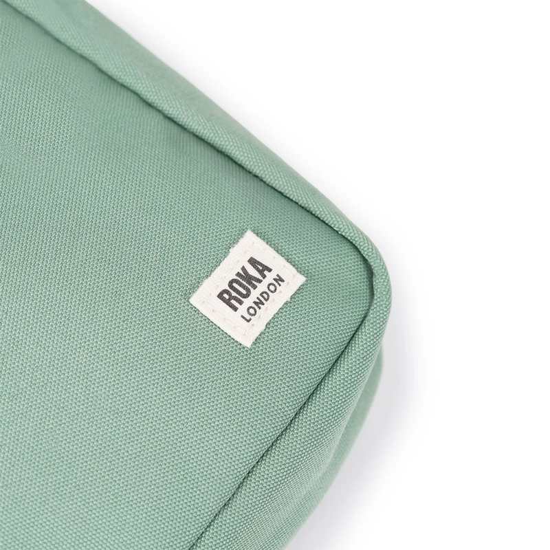 Roka Backpacks Bond Recycled Canvas Cross-body Bag Frost BONDSRCFRO logo