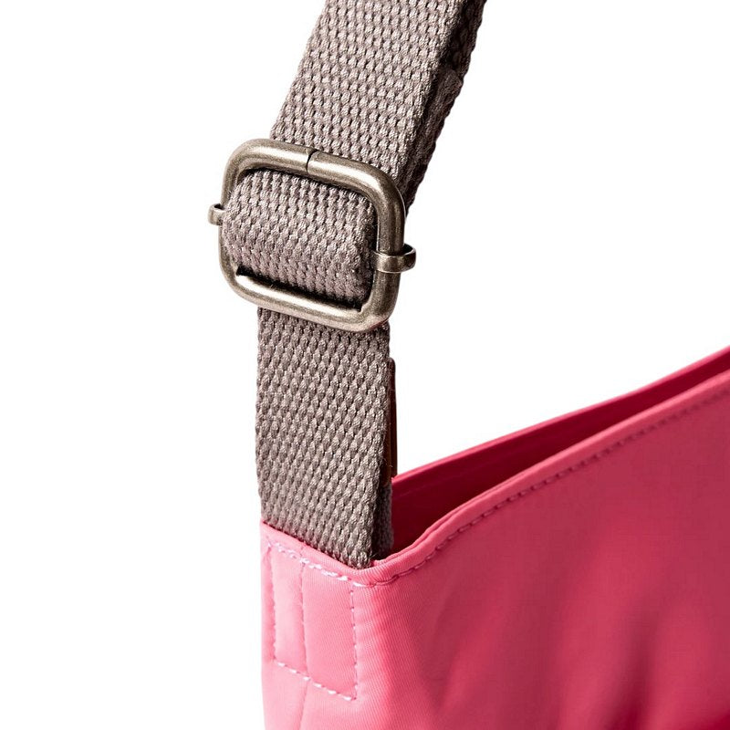 Roka Kennington Recycled Nylon Crossbody Medium Pink Lemonade strap