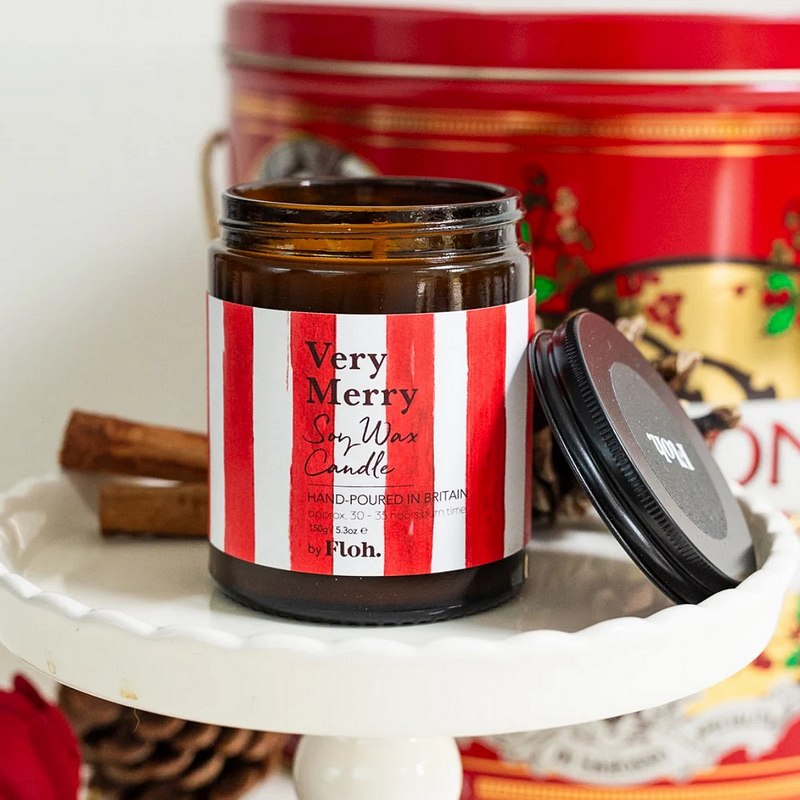 Toasted Crumpet Designs Very Merry Apothecary Candle in Glass Jar lifestyle open