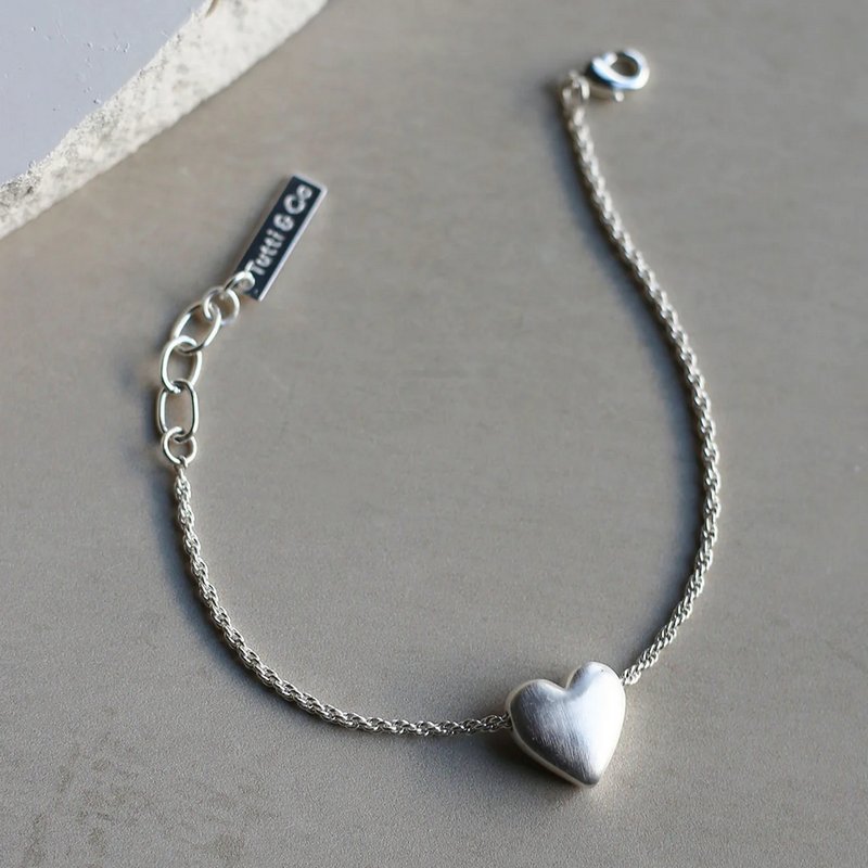 Tutti & Co Jewellery Embrace Bracelet Silver BR638S on stone front