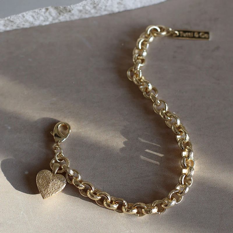 Tutti & Co Solace Bracelet Gold BR646G on stone