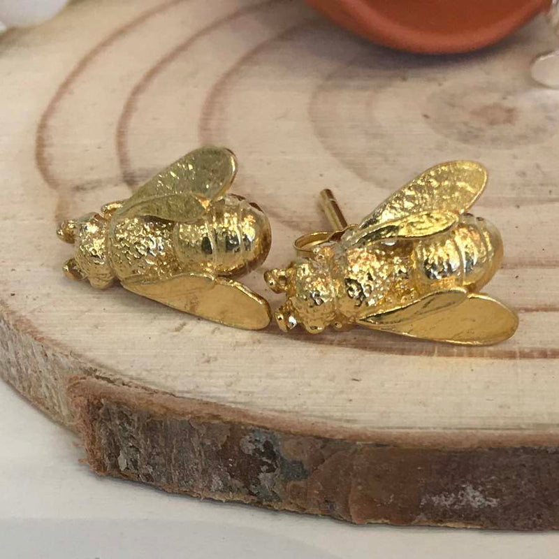 Alex Monroe Jewellery Honey Bee Stud Earrings Gold Plate on wood