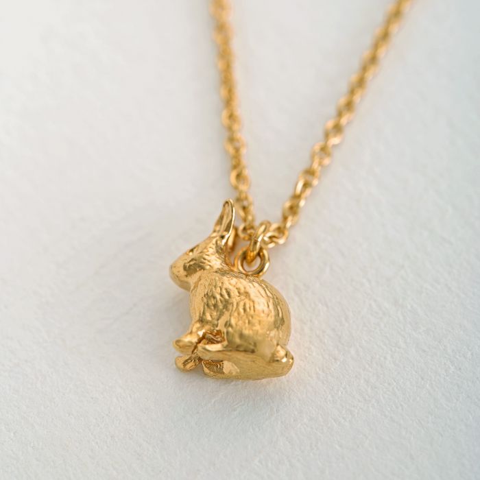 Alex Monroe Jewellery Sitting Bunny Necklace Gold Plated TCN9-GP on paper