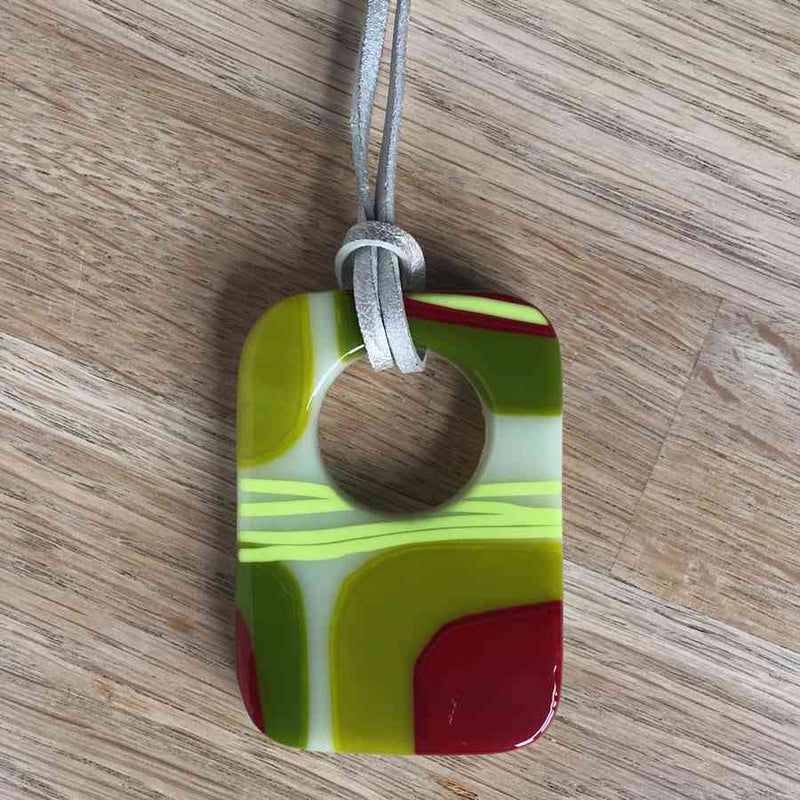 Alicia MacInnes Fused Glass Jewellery Spring Green Holey Necklace on wood