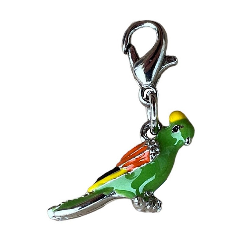 Bombay Duck Charm Enamelled Parrot on branch front