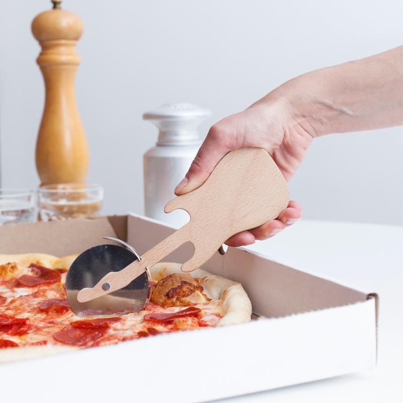 Kikkerland Rockin Pizza Cutter Guitar CU108 in use