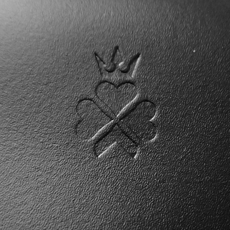 Nixey embossed logo on leather