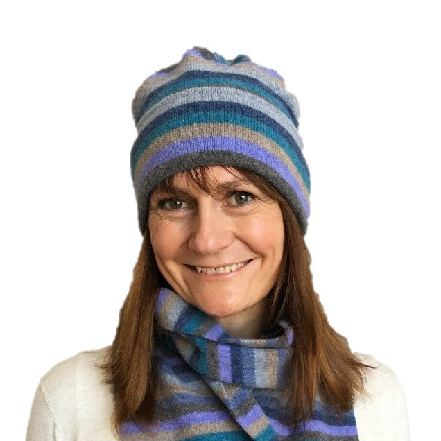 Old School Beauly Knitwear - Inverness Blue Skies Hat on model with matching scarf