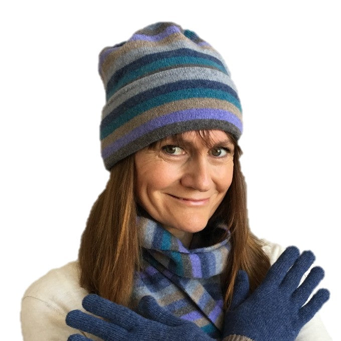 Old School Beauly Knitwear - Inverness Blue Skies Hat on model with matching gloves & scarf