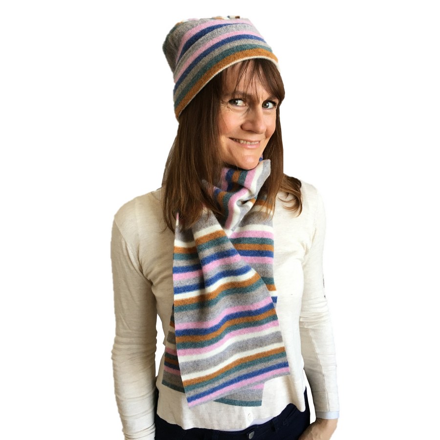 Old School Beauly Knitwear - Inverness Pink Skies Hat on model with scarf