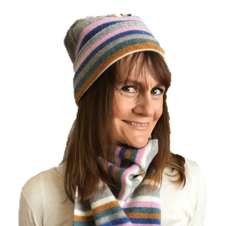 Old School Beauly Knitwear - Inverness Pink Skies Hat on model with scarf