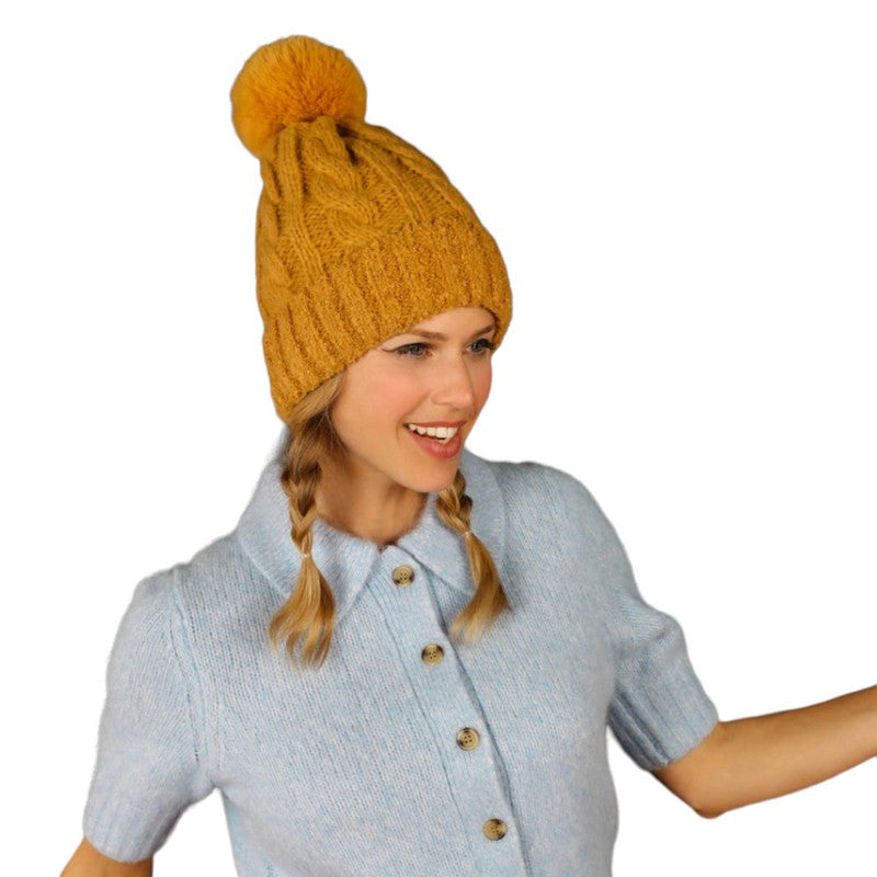 Powder Designs Freya Bobble Hat in Mustard FRE12 on model