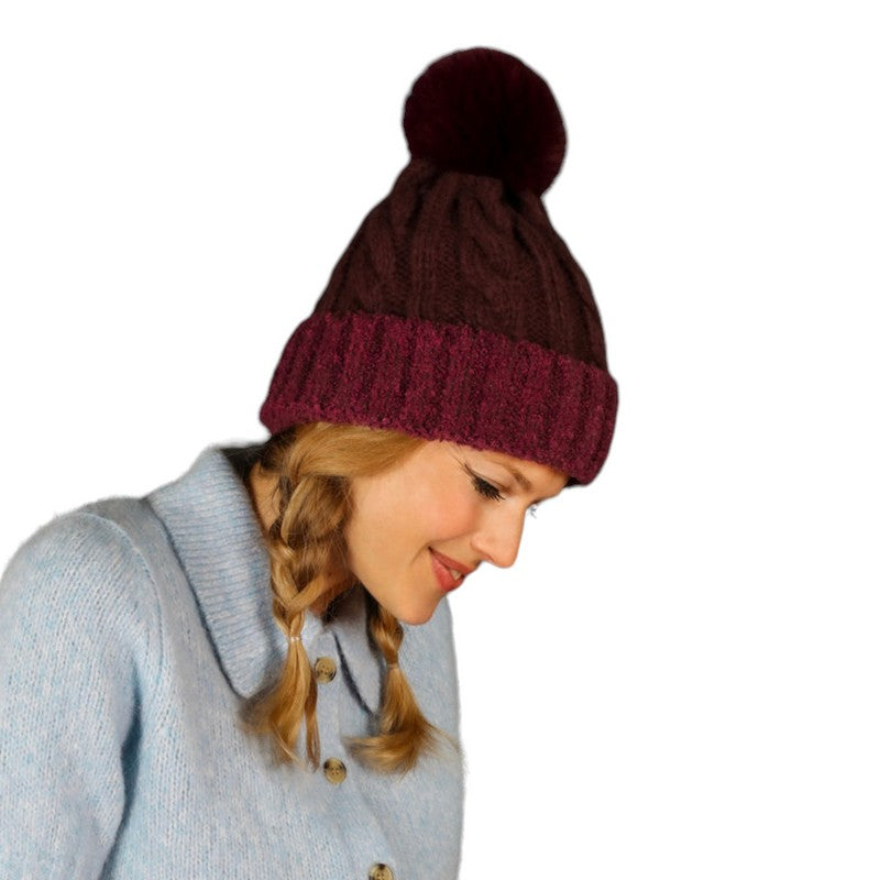 Powder Designs Freya Pompom Hat in Damson FRE11 on model