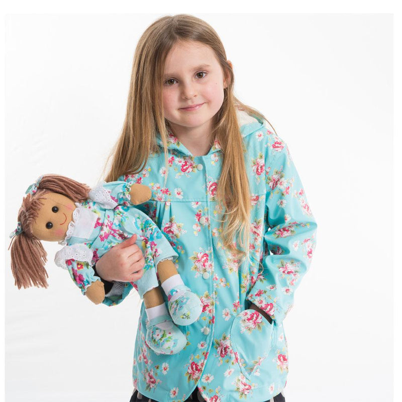 Powell Craft Blue Floral Raincoat on girl with doll