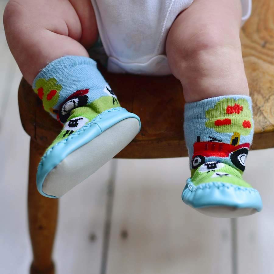 Powell Craft Farmyard Moccasins HKFYM Model on baby
