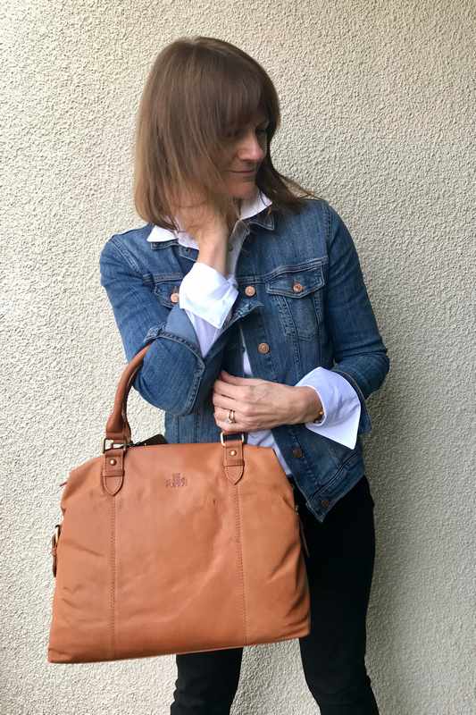 Rowallan Of Scotland Sultan Tan Twin Buckle Bag on model