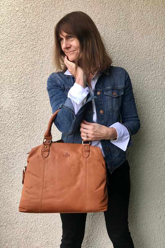 Rowallan Of Scotland Sultan Tan Twin Buckle Bag on model