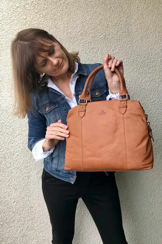 Rowallan Of Scotland Sultan Tan Twin Buckle Bag on model