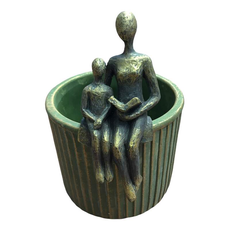 Storytime Pot Hanger Bronze Finish Sculpture 3410994 on plant pot front