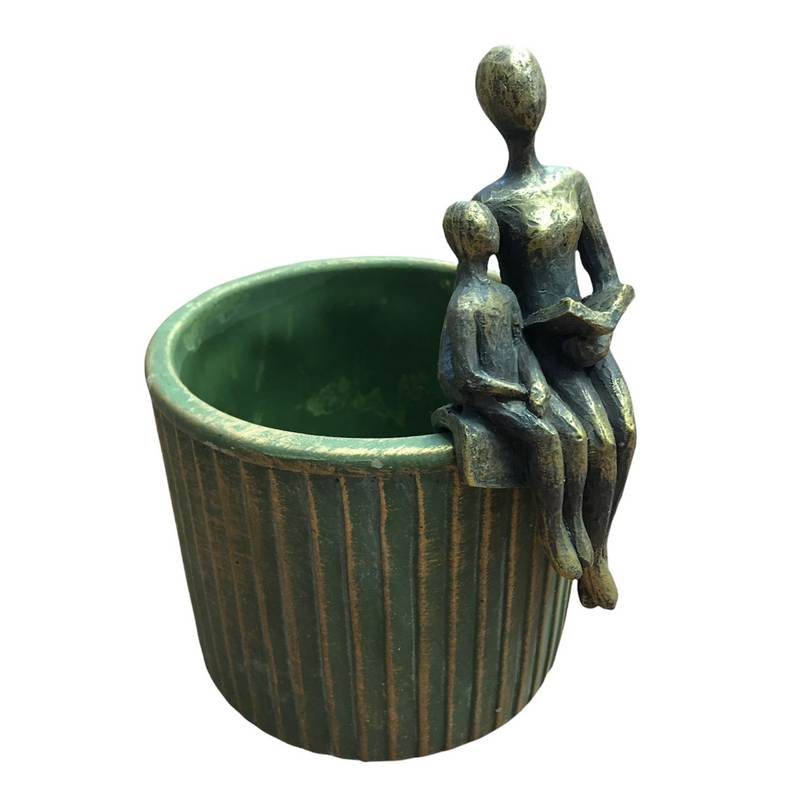 Storytime Pot Hanger Bronze Finish Sculpture 3410994 on plant pot side