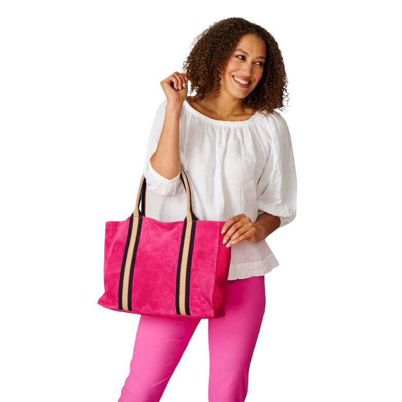 Summer Suede Tote Bag Fuchsia Pink on model's arm