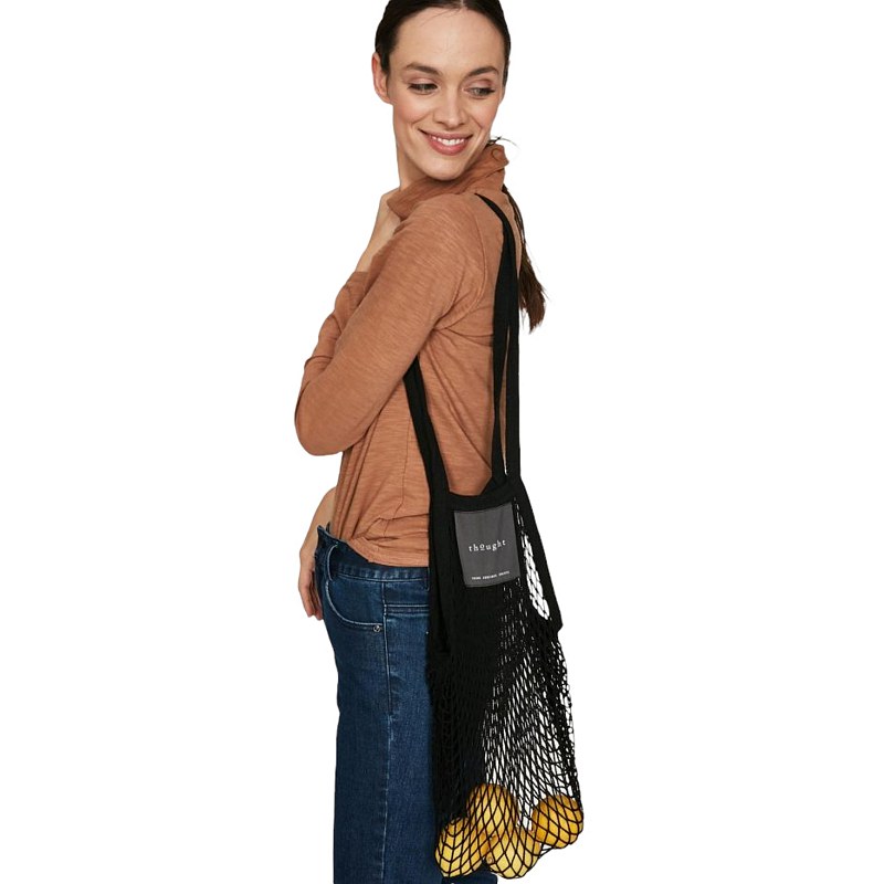 Thought Organic Cotton String Bag in Black WAC4299 on model side